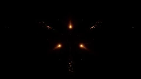 Neon laser lights in a triangular shape with a black background 스톡 사진