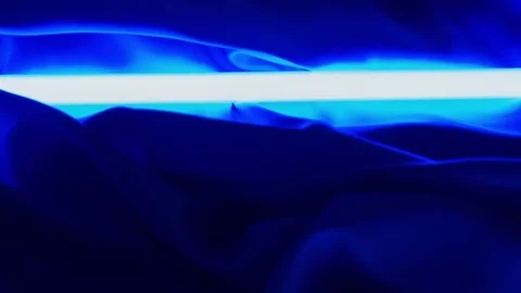 Neon light and textile material. Dark bl... | Stock Video | Pond5