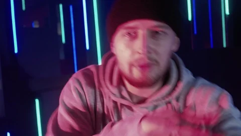 Neon light freestyler man performing rap blue Stock Footage 125909411