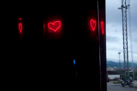Neon light heart reflections Stock Photos