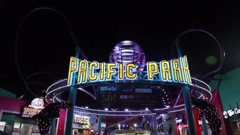 Neon light lit facade of Pacific Park in Santa Monica beach Stock Footage 135797924