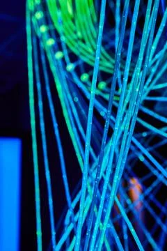 Neon light sticks in spiral pattern Foto stock