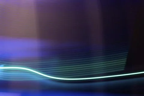 Neon light trail on metallic background Stock Illustration