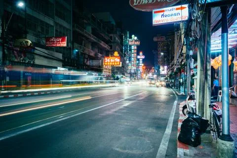 Neon lights and traffic on Yaowarat Road at night, in Chinatown, Bangkok, Tha Stock Photos