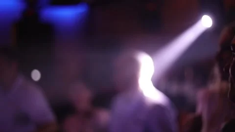 Neon lights on the dance floor. Blurry bokeh Stock Footage 157689388