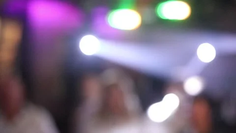 Neon lights on the dance floor. Blurry bokeh Stock Footage 157689422