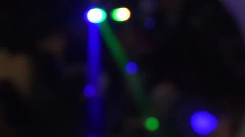 Neon lights on the dance floor. Blurry bokeh Stock Footage 157689436