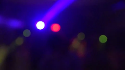 Neon lights on the dance floor. Blurry bokeh Stock Footage 157689442