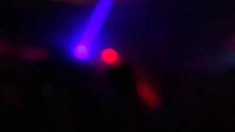 Neon lights on the dance floor. Blurry bokeh Stock Footage 157689450