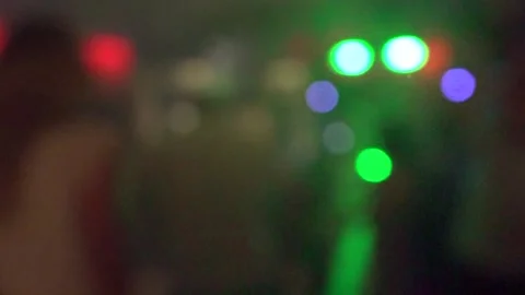 Neon lights on the dance floor. Blurry bokeh Stock Footage 157689452