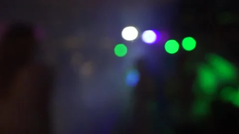 Neon lights on the dance floor. Blurry bokeh Stock Footage 157689462