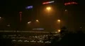 Neon Lights by night, Air Pollution and Huge Traffic in Beijing CBD, China HD Footage