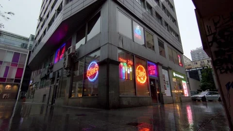 Neon lights on a rainy day Stock Footage 147688001