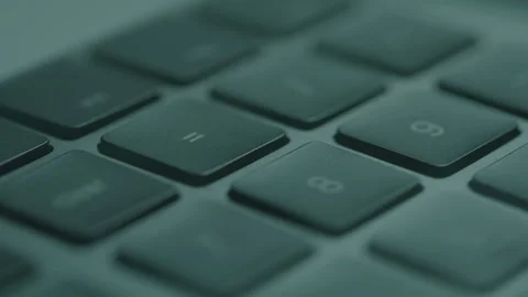 Neon Lights Shifting Colors over a Computer Keyboard Stock Footage 270312965