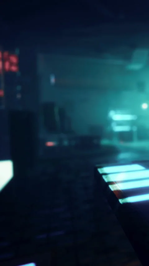 Neon lights shine in a dark space with blurred objects in the background Stock Footage 335358133