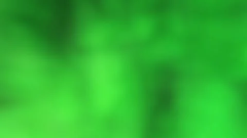 Neon lime and emerald green gradient with dark forest shadows, seamless loop Stock Footage 339204250