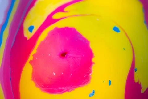 Neon liquid color macro abstract composition with a bright pink. Stock Photos