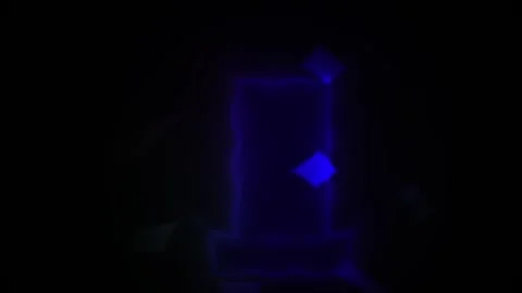 Neon lit electronic device in dark room with colorful glow. Stock Footage 337486379