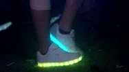 Neon Lit Shoes Dance At Party Stock Footage