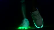 Neon Lit Shoes Dance At Party Stock Footage