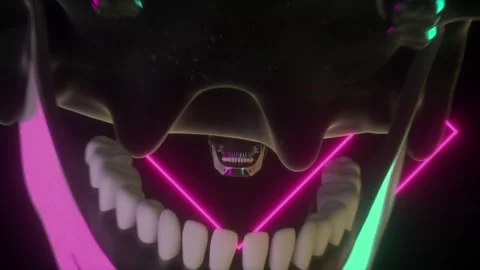 A neon-lit skull design features vibrant colors with a striking background,  Stock Footage 285525498