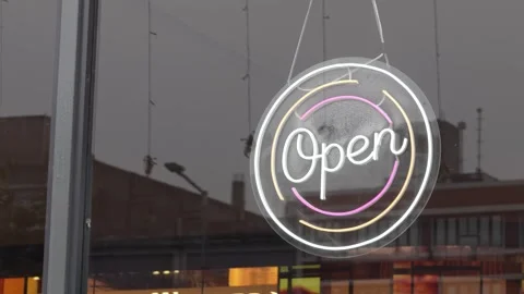 Neon Open Sign Board Hanging at Shop Entrance Close-Up Stock Footage 331340931