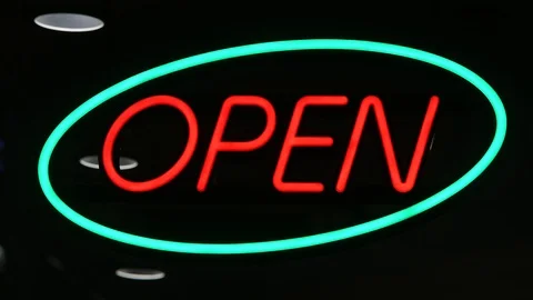Neon open sign in shop window at night Stock Footage 122068005