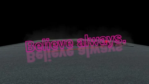 Neon pink believe text glowing on dark textured ground surface with reflection Stock Footage 347340845