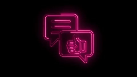 Neon pink chat bubble icon with thumbs up symbol glowing on black background Stock Footage 333956605