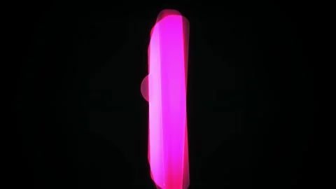 Neon Pink Glowing Rectangle Rotating in Dark Void Stock Footage 343738753