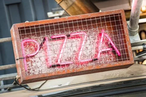 Neon pizza sign Stock Photos