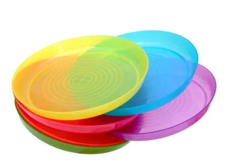 Neon plastic dishes Stock Photos