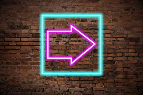 Neon pointer with arrow on brick wall Stock Photos