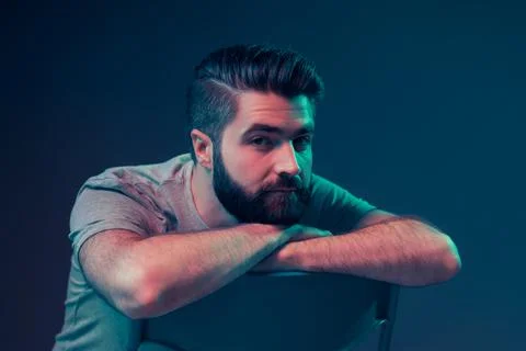 Neon portrait of a young attractive man Stock Photos