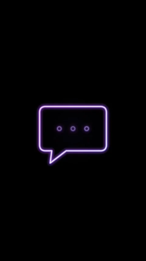 Neon purple speech bubble icon with three dots pulses gently against a black Stock Footage 345183329
