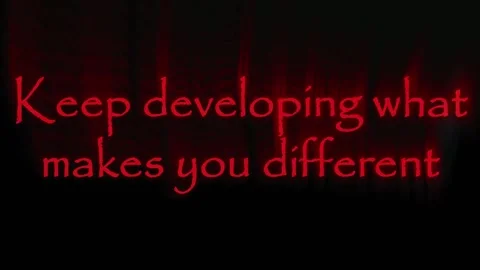 Neon Red Script Text Keep Developing What Makes You Different UVP Concept Video stock 345523100