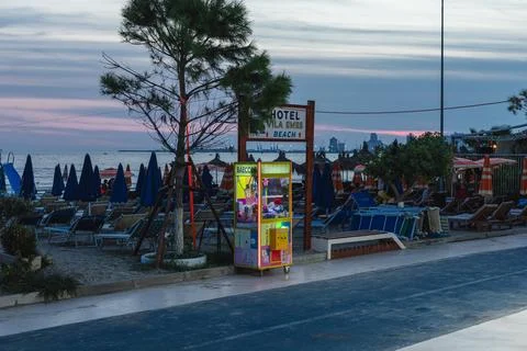 Neon Redhead Cat Claw Machine at Durres Beach Albania Stock Photos