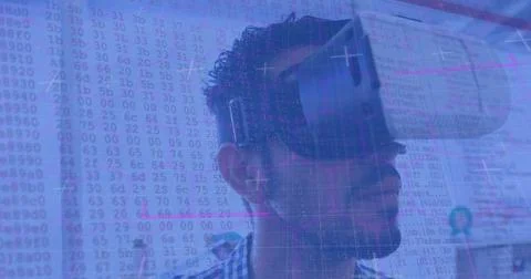 Neon scope scanner and binary coding data processing against man wearing vr 스톡 사진