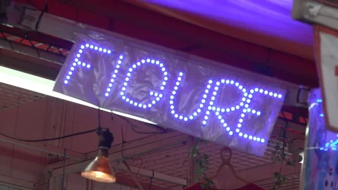 Neon Sign 'Figure' Stock Footage 74168947
