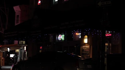 Neon Signed Diner on Corner of City Street Stock Footage 113409297