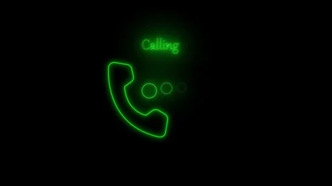 Neon-style glowing phone handset icon and two dots with the word calling an.. Stock Footage 337079077