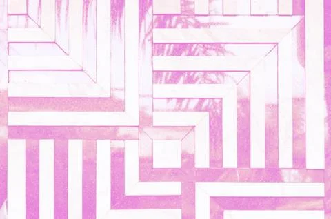 Neon toned psychedelic background. Linear, angular pattern of marble tiles Stock Photos