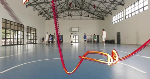 Neon trails appearing, looping around nine-man team stepping forward and warming Stock Footage 323406655
