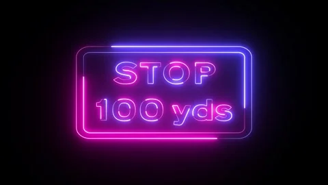 Neon triangular road caution sign with100 yards ahead to stop sign. Neon tr.. Stock Footage 296490259