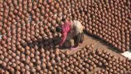 Nepal Bhaktapur Potters' Square, Woman Drying Pots Tourism Abstract Stock Footage
