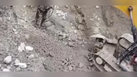 Nepal: Crews Blast Through Mud And Rock To Reach Trapped Workers In Nepal... Stock Footage 344513810