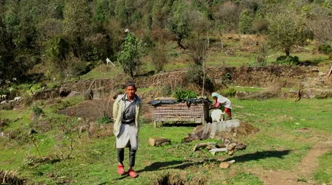 NEPAL –  MARCH 18 2016: Mountain HD video. Farm village: peoples animals Stock Footage 64827961