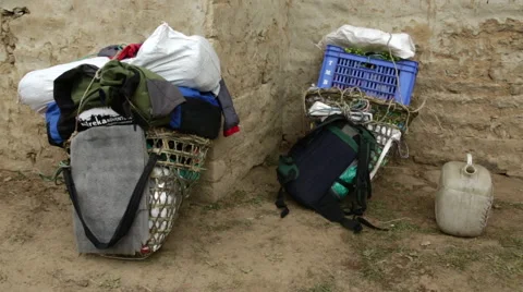 Nepal Porter baskets carrying various bags and items sitting outsite Solukhumbu, 스톡 동영상 47332799