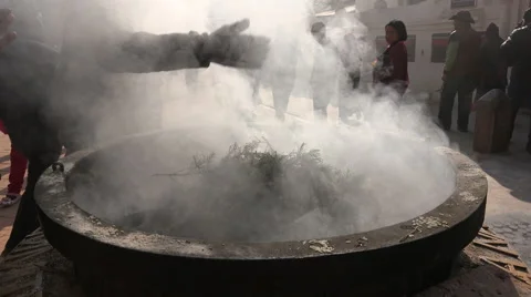 Nepal religion, Asia, burning incense and cypress twigs, pilgrimage, silhouettes Stock Footage