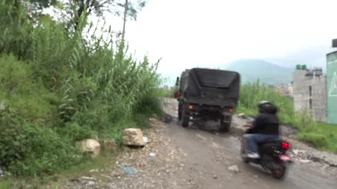 Nepal: Roads to mudslide-hit areas still blocked, hamper rescue efforts i... Stock Footage 344034089